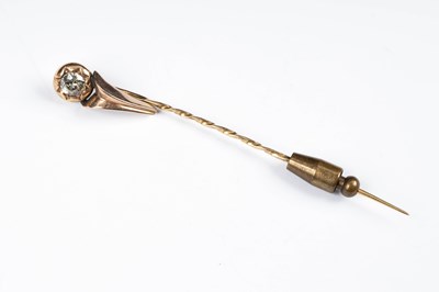 Lot 218 - A gold and diamond stick pin