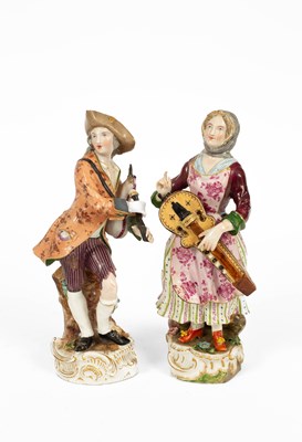 Lot 673 - A near pair of Meissen style figures