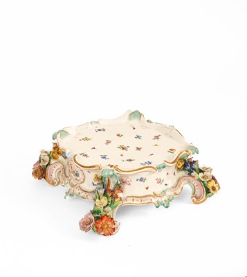 Lot 674 - A Meissen flower encrusted stand