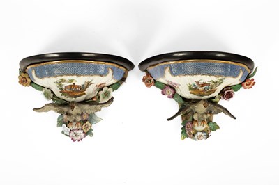 Lot 682 - A pair of Meissen style wall brackets