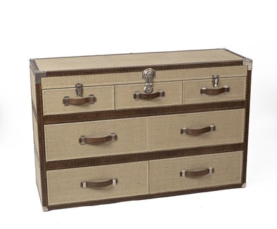 Lot 579 - A canvas covered chest of drawers