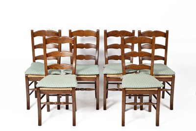 Lot 583 - A set of six oak ladder back chairs