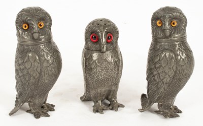 Lot 720 - Three pewter owl cruets