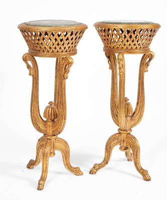 Lot 72 - A pair of gilt jardinière stands