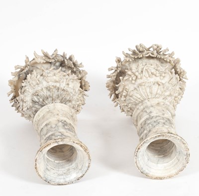 Lot 74 - A pair of alabaster urns on pedestal bases