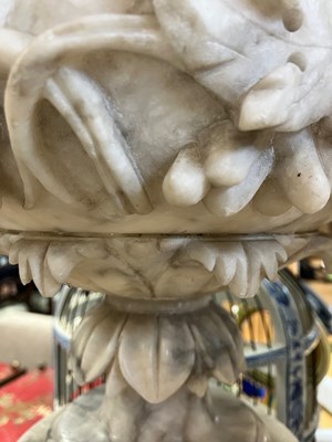 Lot 74 - A pair of alabaster urns on pedestal bases