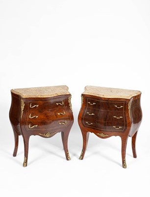 Lot 91 - A pair of French walnut and mahogany commodes