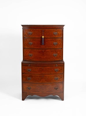 Lot 97 - A reproduction walnut and mahogany chest on chest