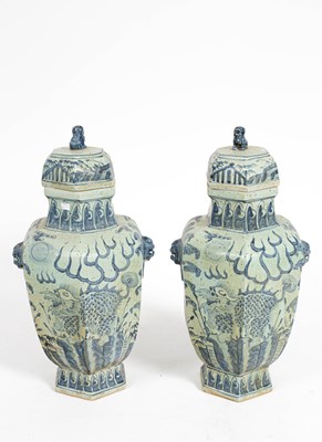 Lot 103 - A pair of Chinese blue and white vases with covers