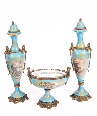 Lot 107 - A Sèvres style three-piece garniture