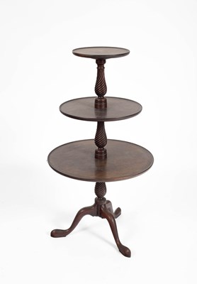 Lot 109 - A George III style mahogany three-tier dumb waiter