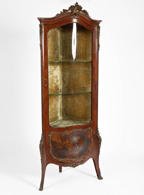 Lot 111 - A French kingwood corner display cabinet