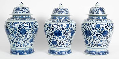 Lot 133 - Three Chinese blue and white vases with covers