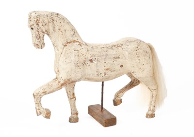 Lot 149 - A carved painted wooden horse