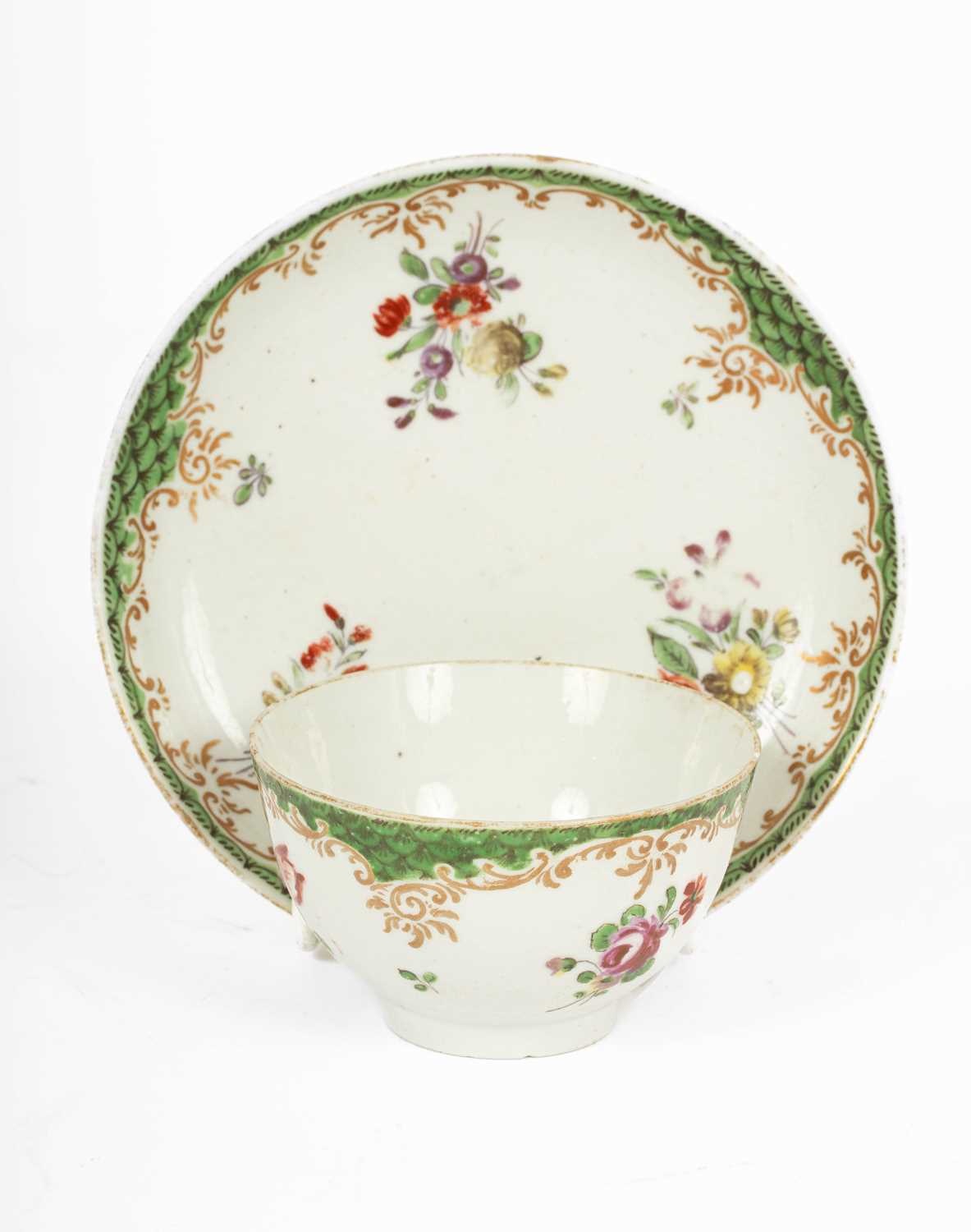 Lot 818 - A Cozzi porcelain tea bowl and saucer