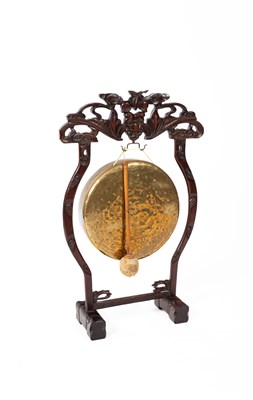 Lot 558 - A Chinese carved wooden gong stand