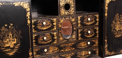 Lot 169 - A Chinese export black lacquered cabinet on stand