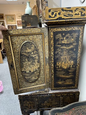 Lot 169 - A Chinese export black lacquered cabinet on stand