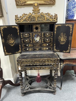 Lot 169 - A Chinese export black lacquered cabinet on stand