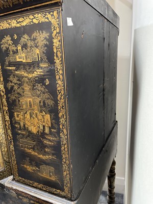 Lot 169 - A Chinese export black lacquered cabinet on stand