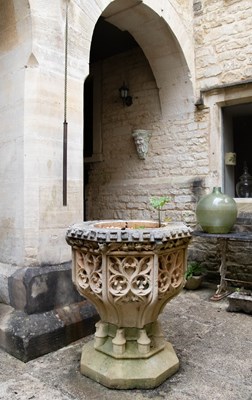 Lot 6 - A Victorian carved stone font of Gothic design