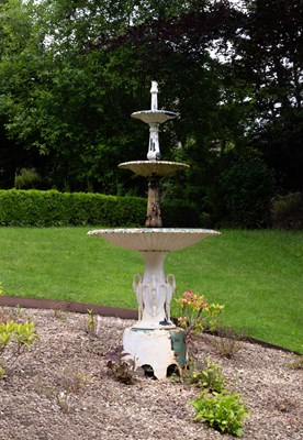 Lot 11 - A painted cast iron three-tier fountain