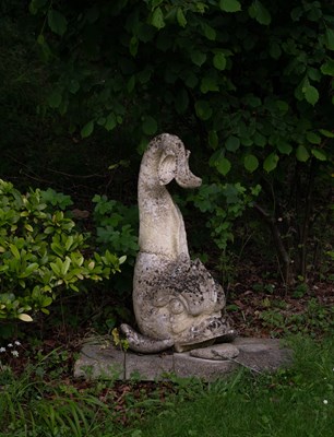 Lot 12 - A reconstituted stone figure of a dolphin