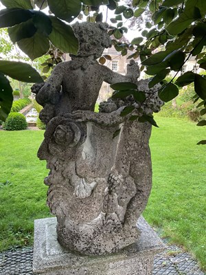 Lot 13 - A reconstituted stone group of Bacchantes with a dog