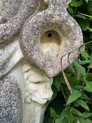 Lot 22 - A reconstituted stone figure of Bacchus