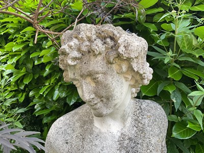 Lot 22 - A reconstituted stone figure of Bacchus
