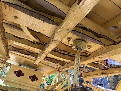 Lot 31 - A burgundy and yellow gypsy caravan