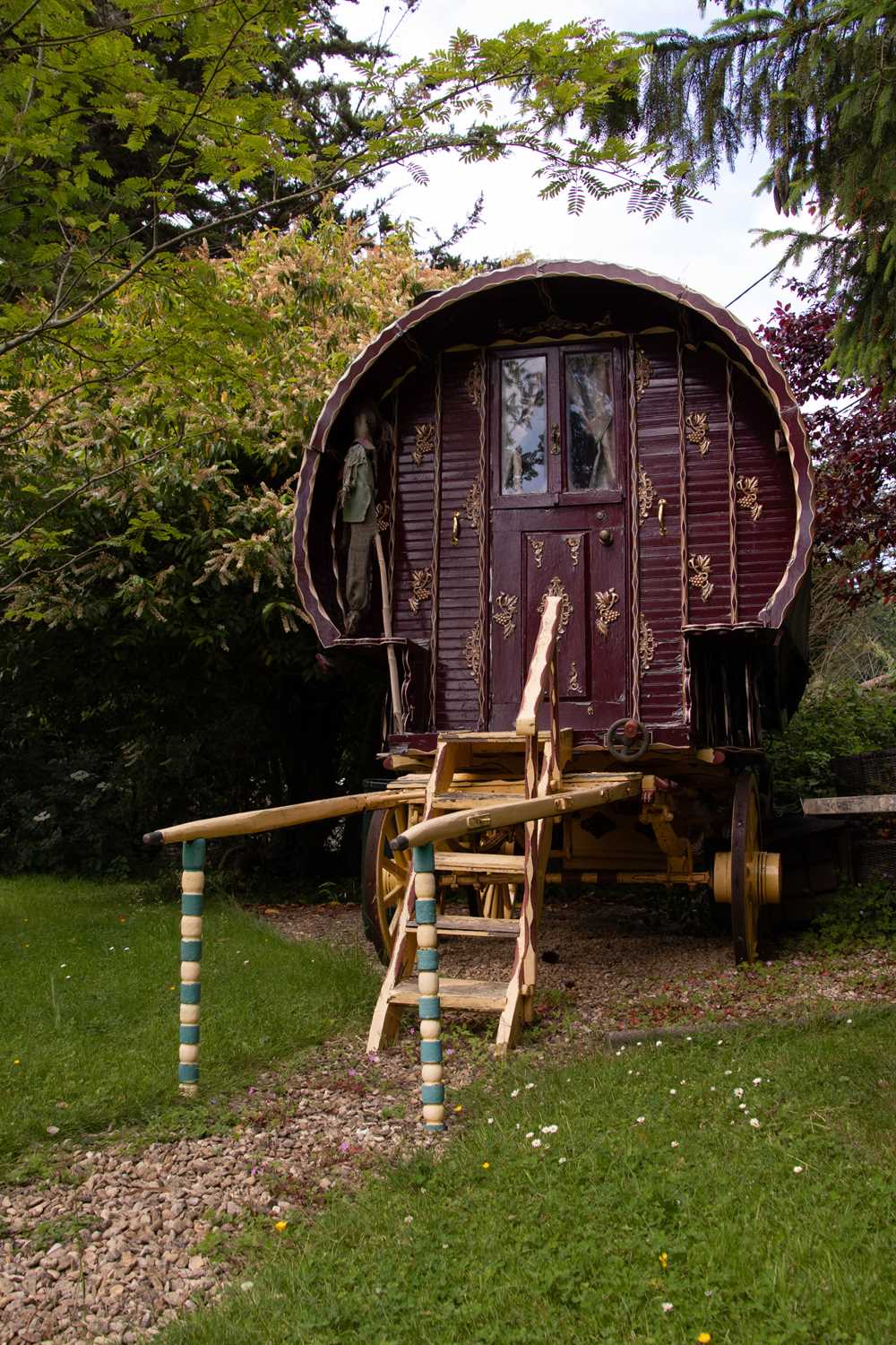 Pyre Caravan Lot 31 - A burgundy and yellow gypsy caravan