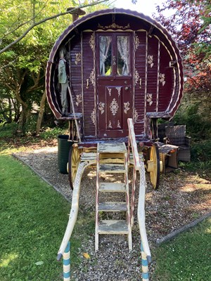 Lot 31 - A burgundy and yellow gypsy caravan