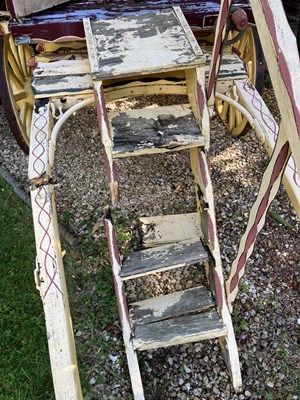 Lot 31 - A burgundy and yellow gypsy caravan