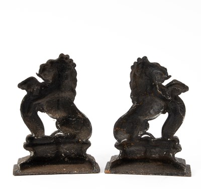 Lot 37 - A pair of cast iron lion door stops
