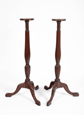 Lot 188 - A pair of mahogany torchères