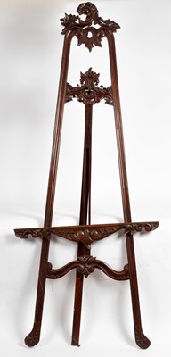 Lot 192 - A mahogany carved and pierced easel