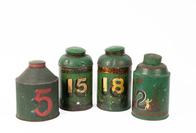 Lot 196 - A pair of green tole jars and covers