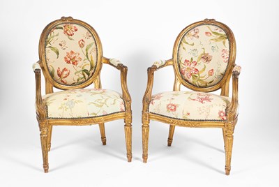 Lot 207 - A pair of French gilt framed open armchairs