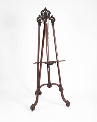 Lot 234 - A carved mahogany easel