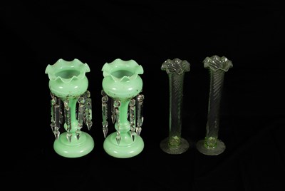 Lot 238 - A pair of green glass lustres