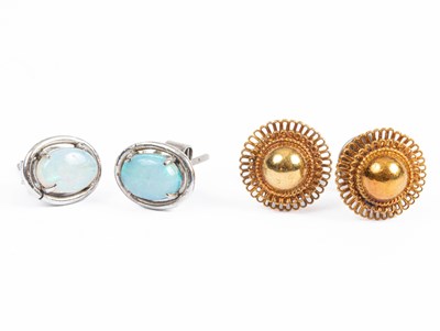 Lot 380 - A pair of 18K gold and opal stud earrings