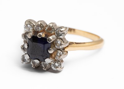 Lot 291 - A sapphire and diamond square cluster ring