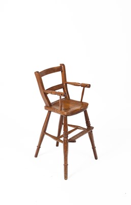 Lot 502 - An oak child's chair/high chair