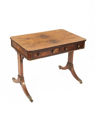 Lot 166 - A Regency rosewood and gilt metal mounted library table