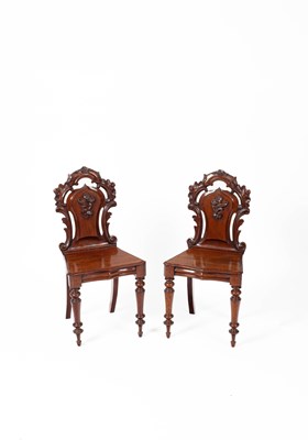 Lot 474 - A pair of Victorian mahogany hall chairs