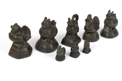 Lot 518 - A set of eight Chinese opium weights