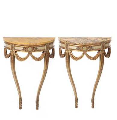 Lot 518 - A pair of Italian marble top console tables