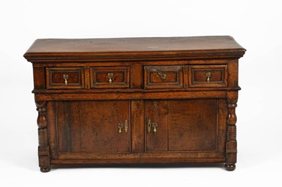 Lot 528 - A 17th Century style oak sideboard