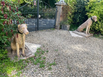 Lot 36 - A pair of Cavendish stone wolfhounds